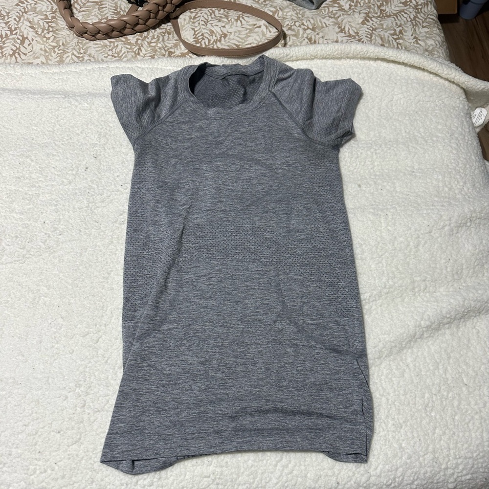 Grey swiftly Lulu shirt in good condition worn a few times